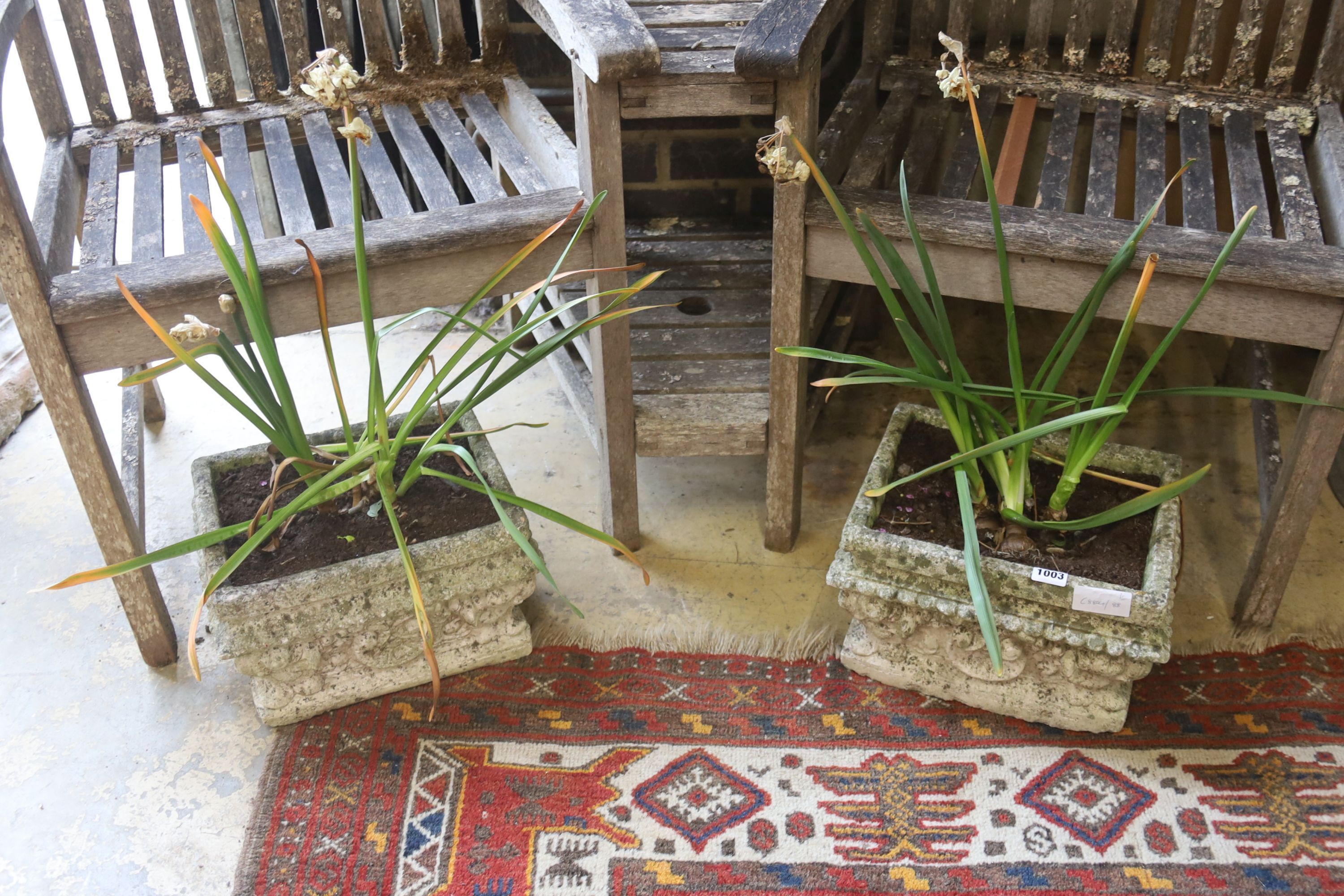 A pair of rectangular reconstituted stone garden planters, width 33cm, depth 27cm, height 20cm